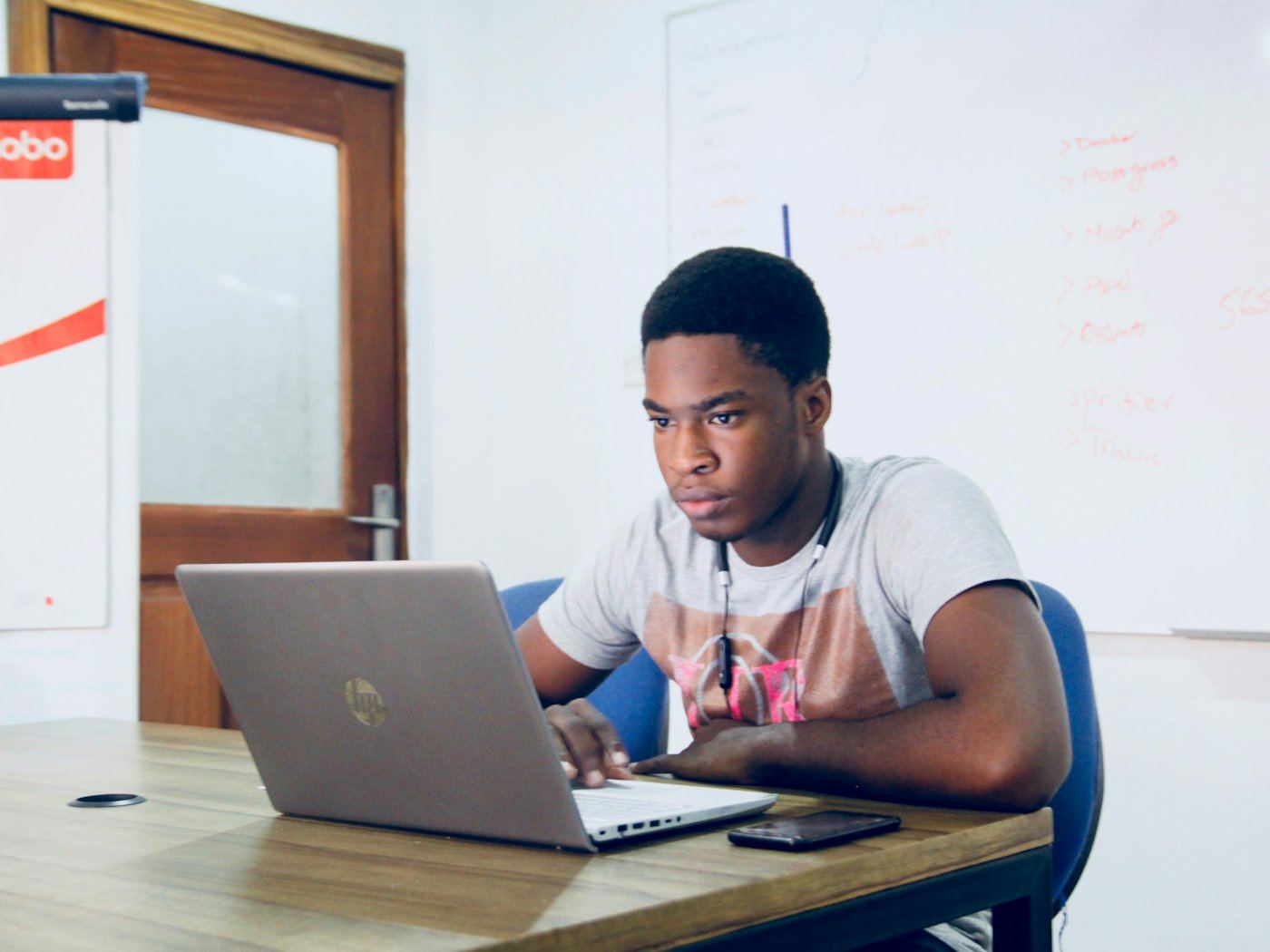 A student working on a laptop